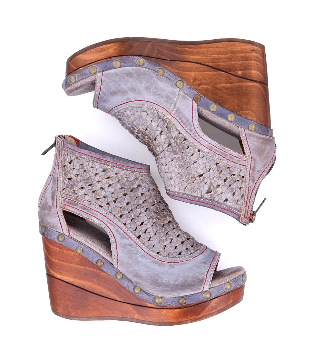 A pair of Odette women's wedge sandals with a wooden platform from Bed Stu.