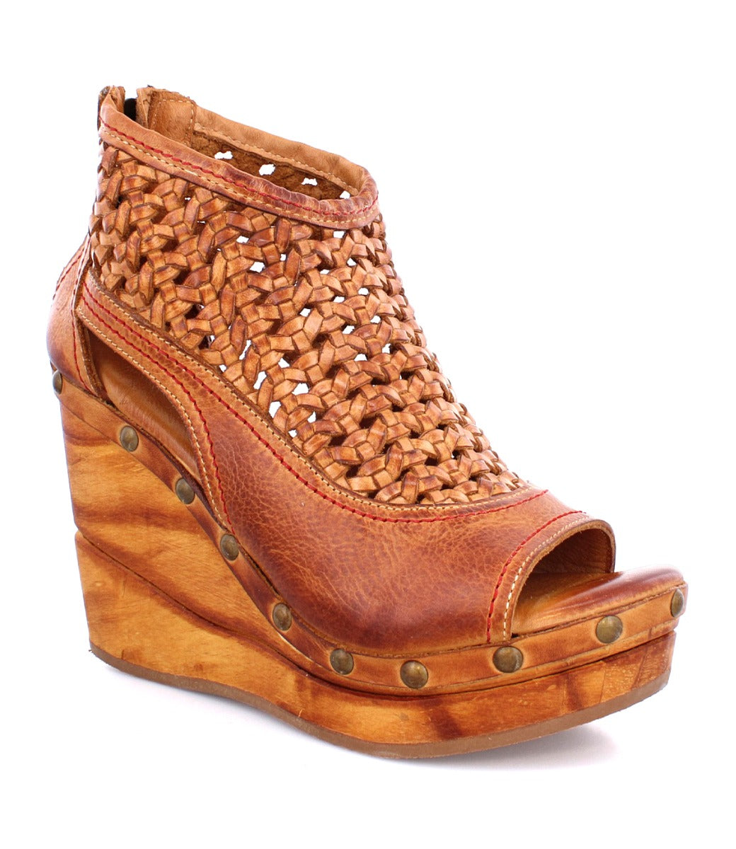 An Odette women's wedge sandal with a wooden platform by Bed Stu.