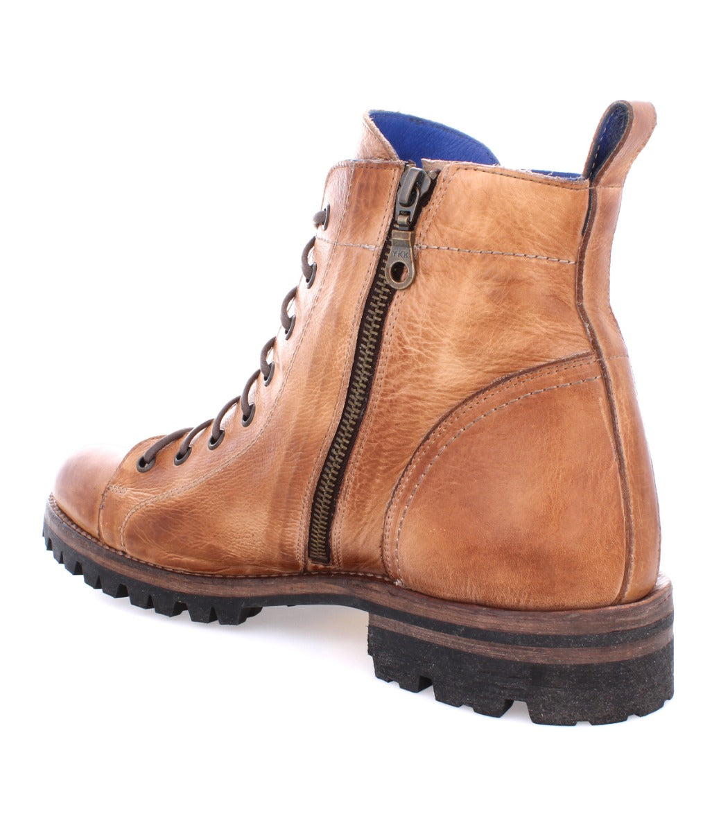 An Old Bowen Trek men's tan leather boot with blue zippers from Bed Stu.