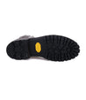 A pair of Old Bowen Trek shoes by Bed Stu with yellow soles on a white background.
