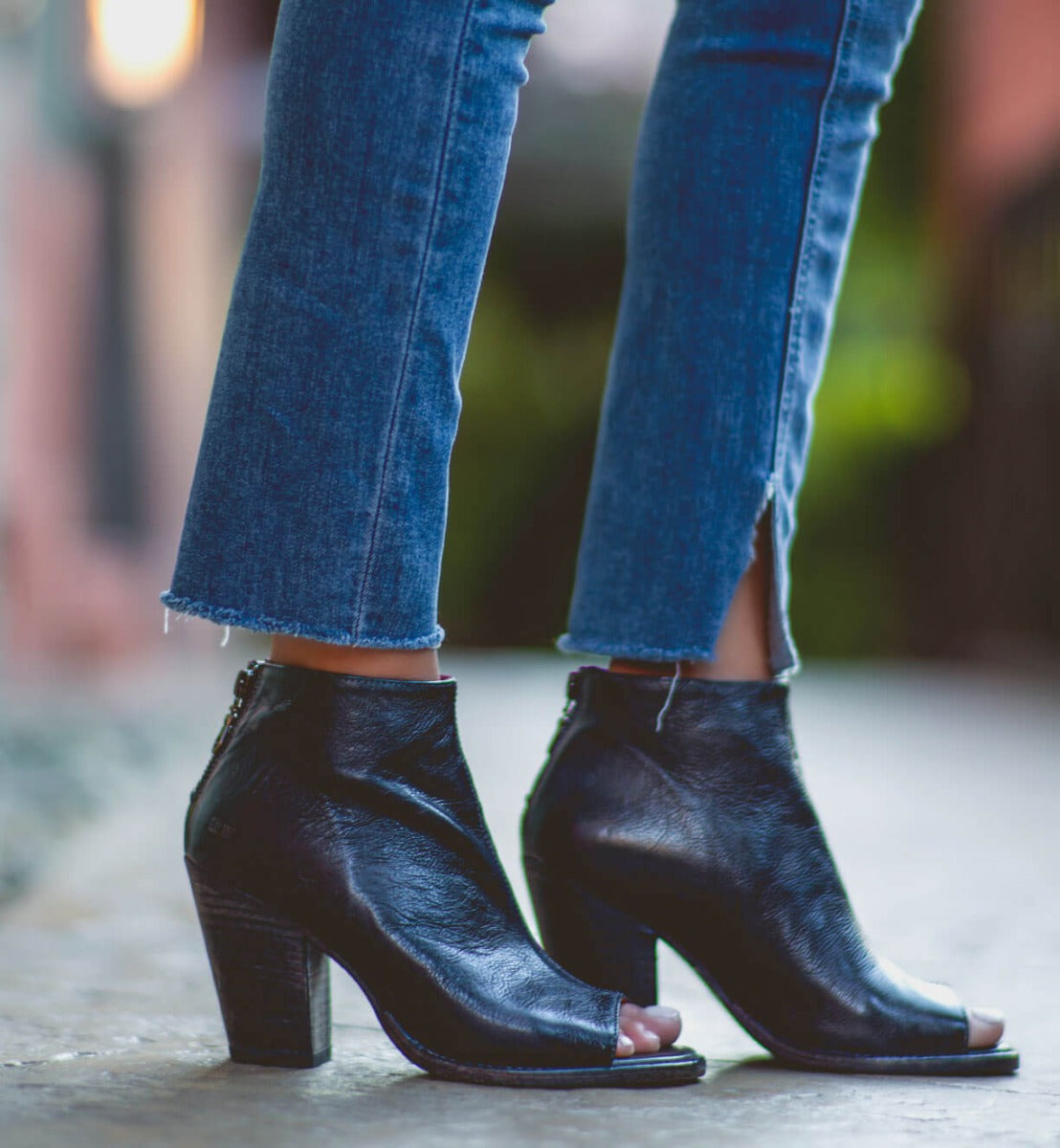 Onset peep toe booties in black leather by Bed Stu.