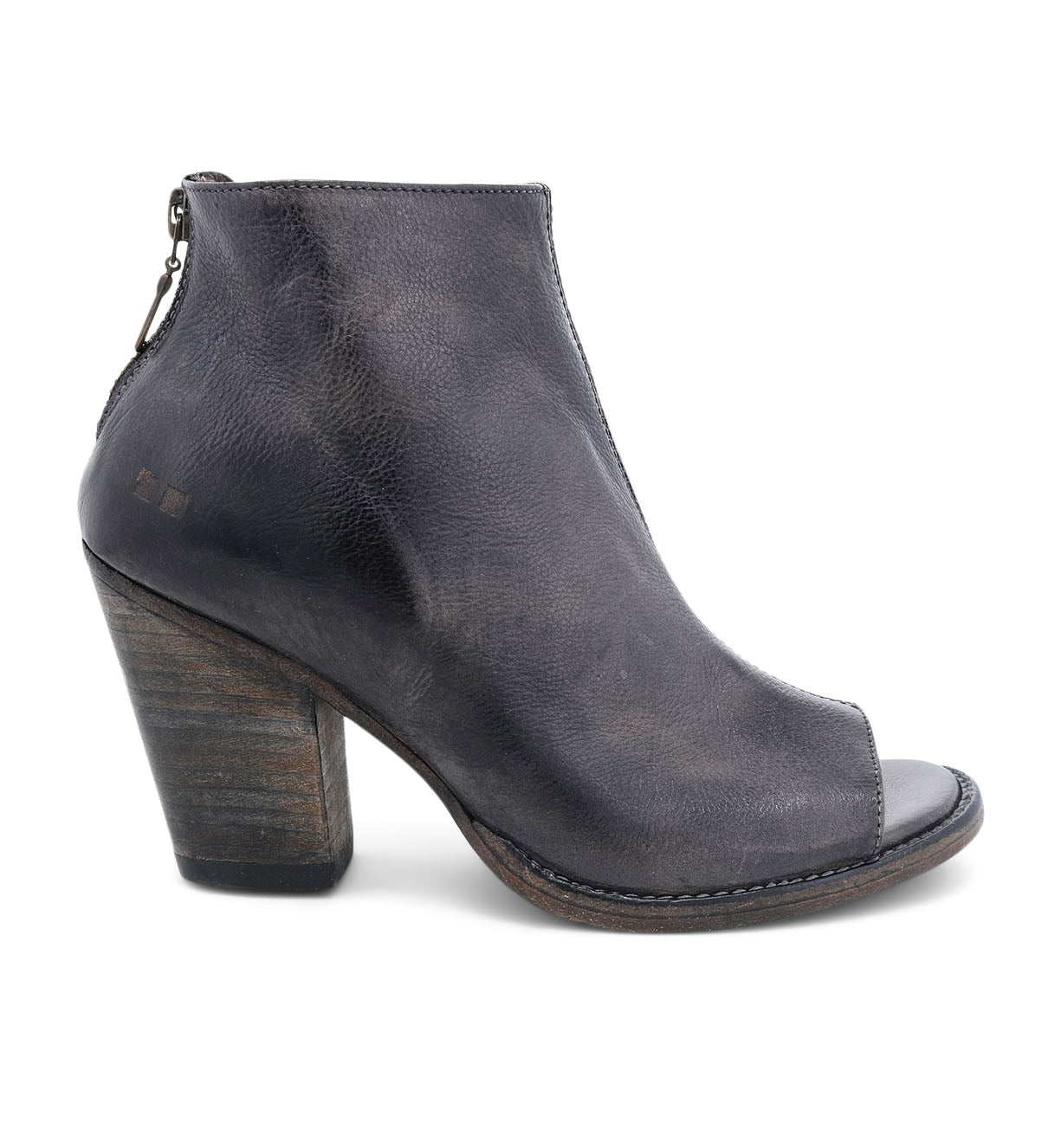 A black leather Bed Stu ankle boot with a wooden heel.