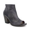 A women's black peep toe bootie with a wooden heel, the Onset from Bed Stu.