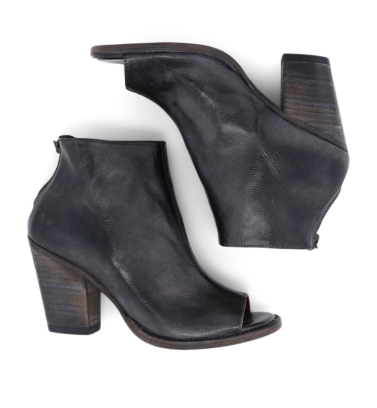 A pair of Bed Stu Onset black leather ankle boots with a wooden heel.