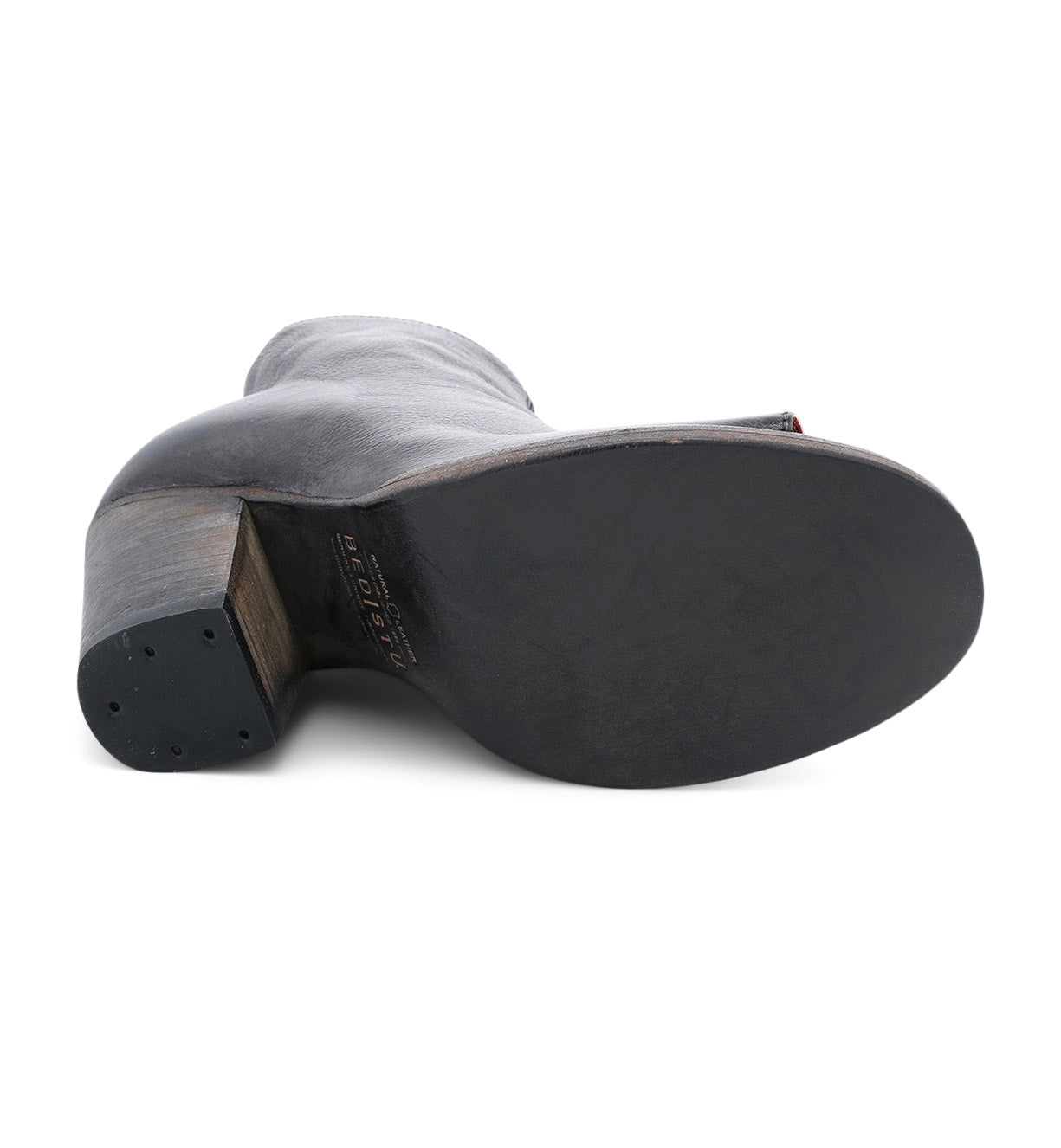 The back of a Onset black leather boot with a wooden heel by Bed Stu.