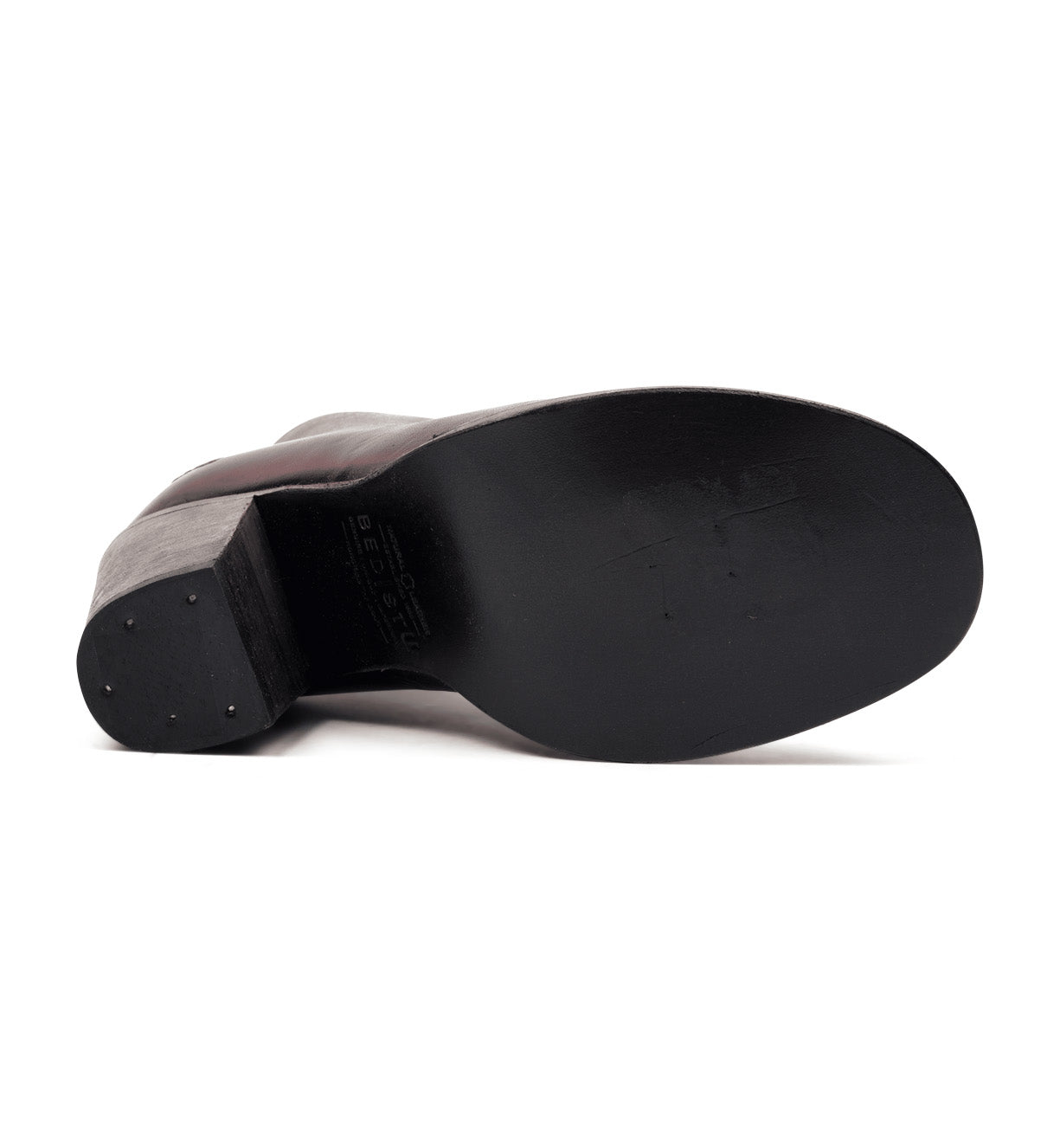 A pair of Onset shoes with a Bed Stu black sole on a white background.