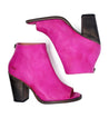 A pair of pink peep toe ankle boots with a wooden heel, the Onset by Bed Stu.