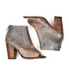 A pair of Bed Stu Onset brown leather ankle boots with a wooden heel.
