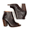 A pair of Bed Stu Onset brown leather ankle boots with a wooden heel.