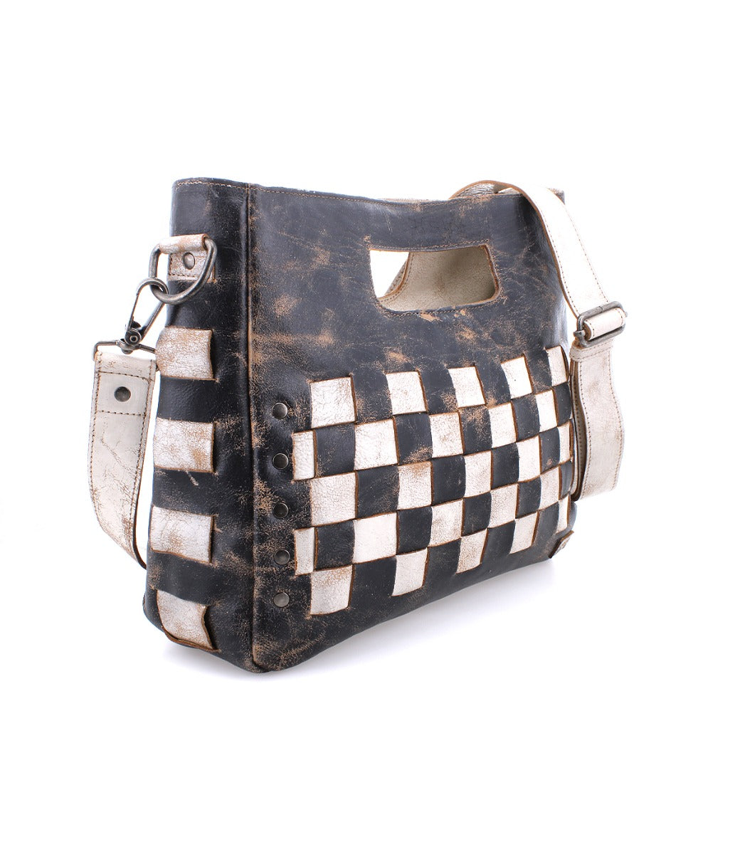 A distressed black and white leather Orchid bag with a checkered pattern by Bed Stu.