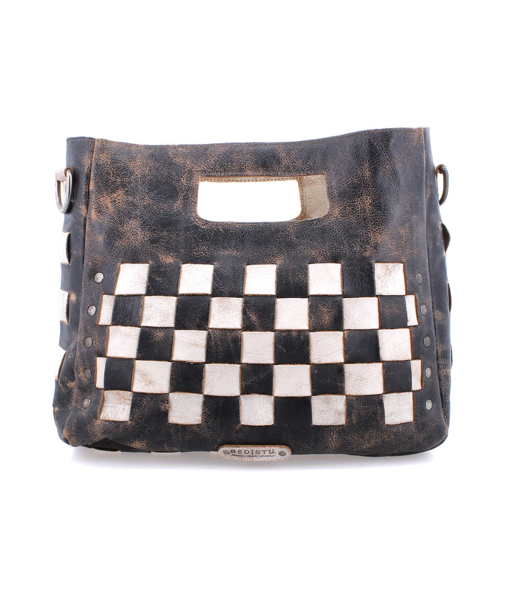 A distressed black and white leather Orchid bag with a checkered pattern by Bed Stu.