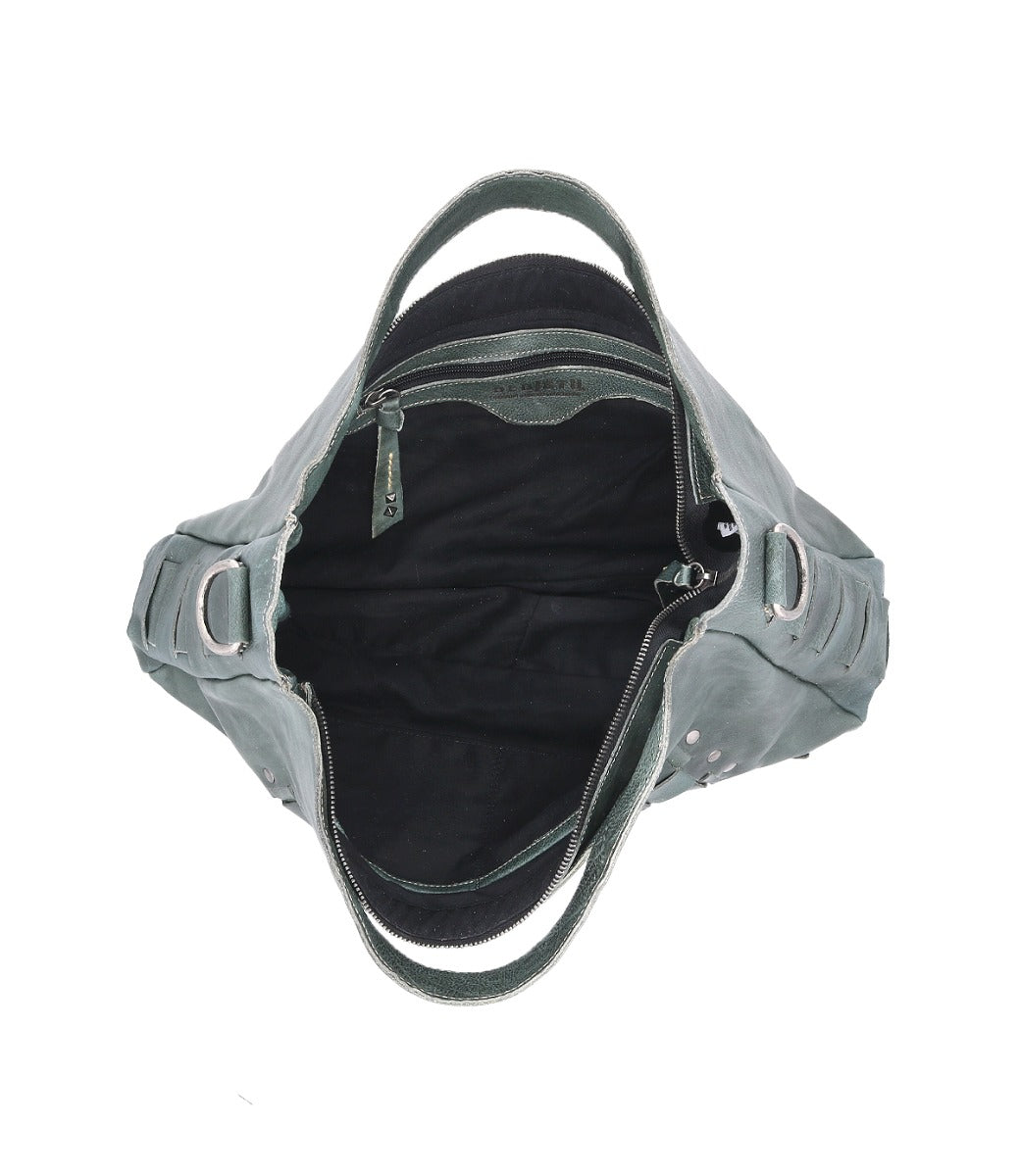 The inside of a Bed Stu Orchid L grey leather bag with zippers.