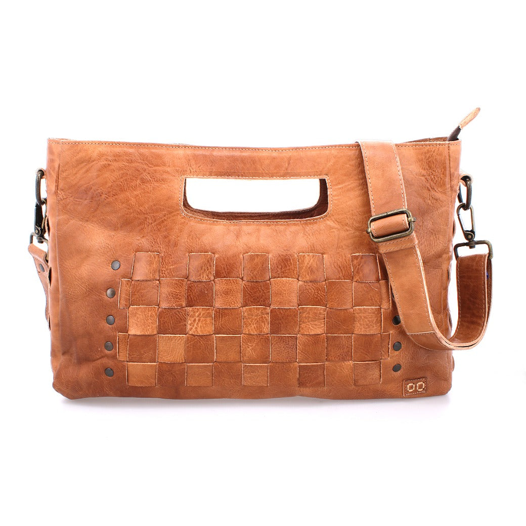 A Bed Stu Orchid L tan leather bag with a shoulder strap.