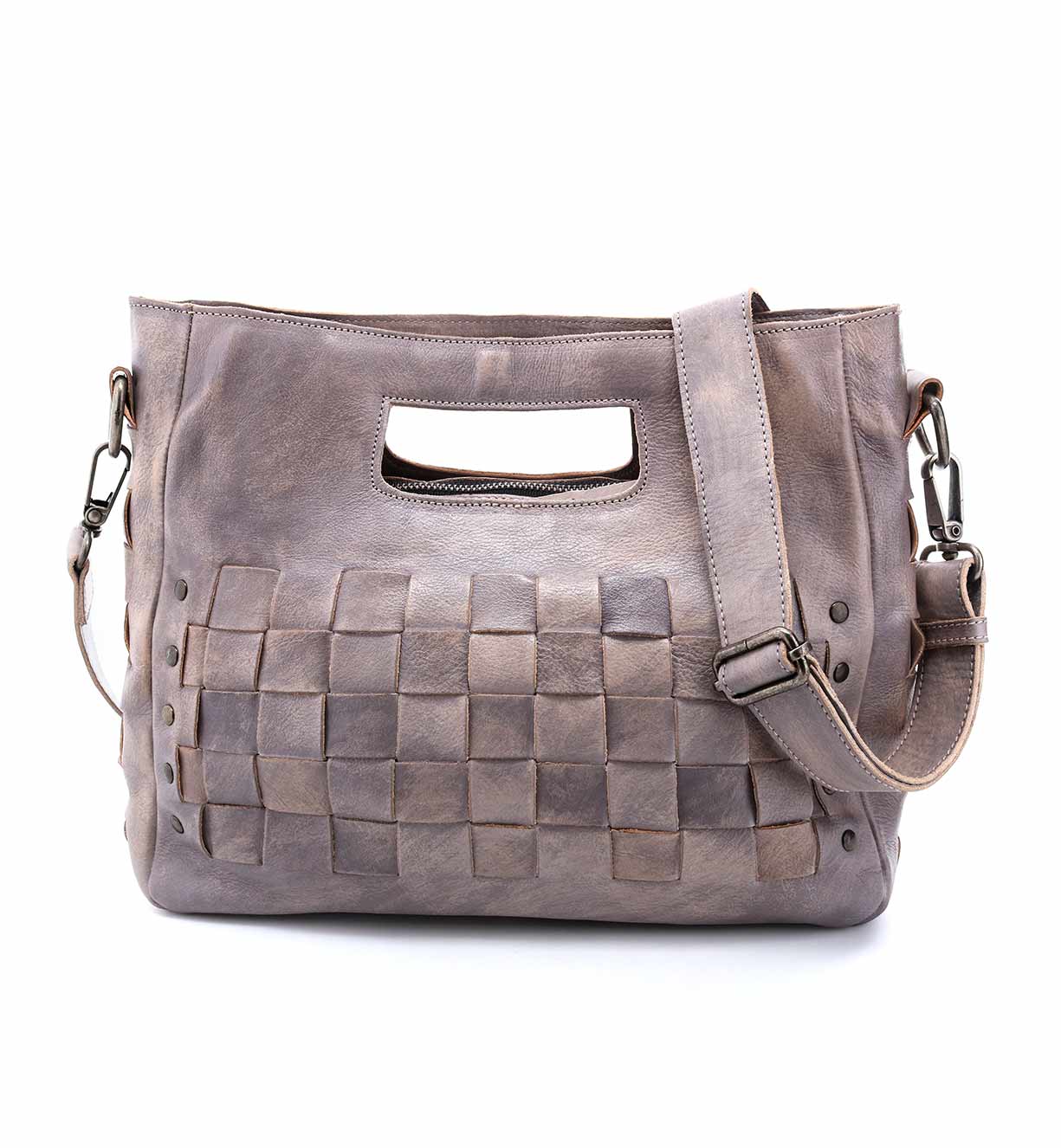 A Bed Stu Orchid grey leather bag with a strap and handles.