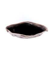 An Orchid bowl with a metal handle by Bed Stu.
