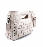 A white Orchid handbag with a woven pattern by Bed Stu.