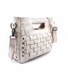 A white Orchid handbag with a woven pattern by Bed Stu.