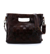 An Orchid bag by Bed Stu, made of brown leather with a strap and handle.