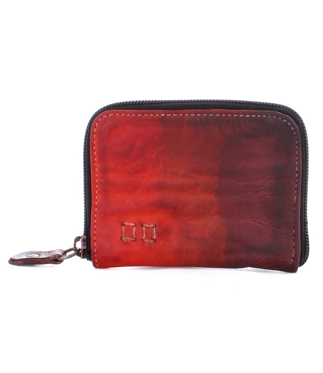 An Ozzie by Bed Stu red leather wallet with a zipper.