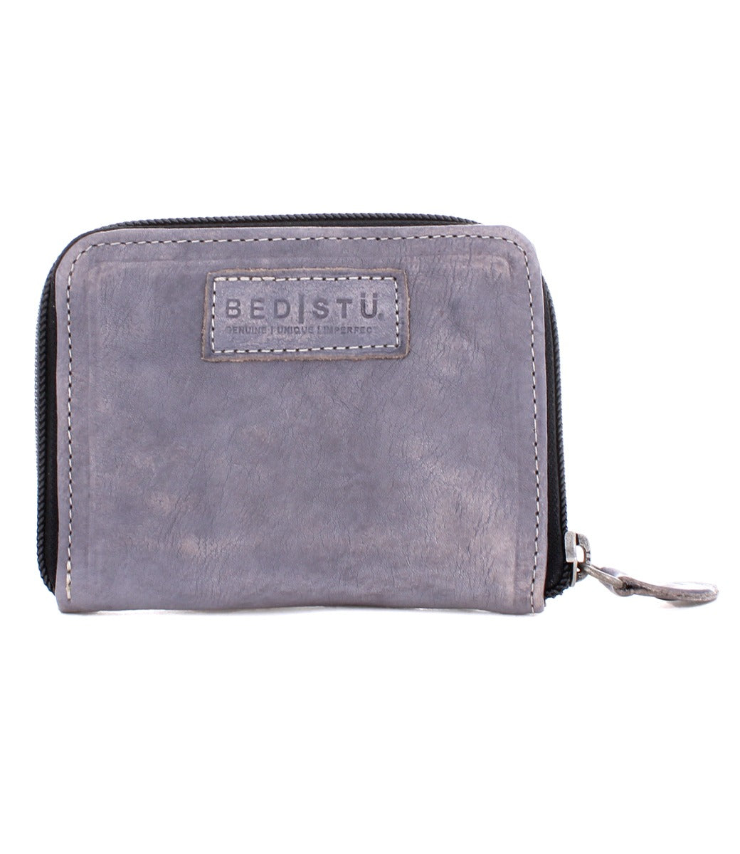 A grey leather Ozzie wallet from Bed Stu with a zipper.