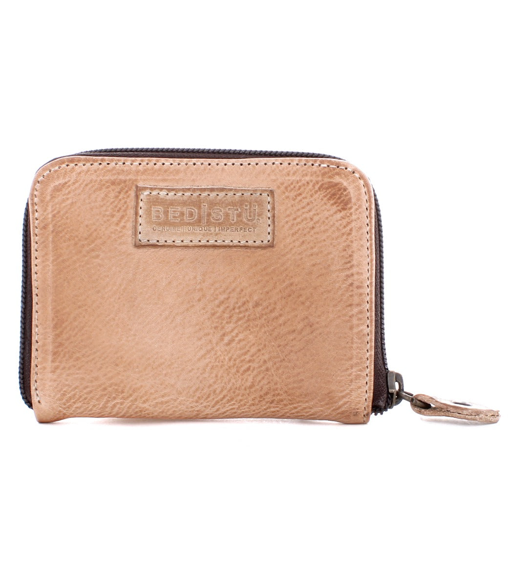 An Ozzie leather wallet with a zipper from the Bed Stu brand.