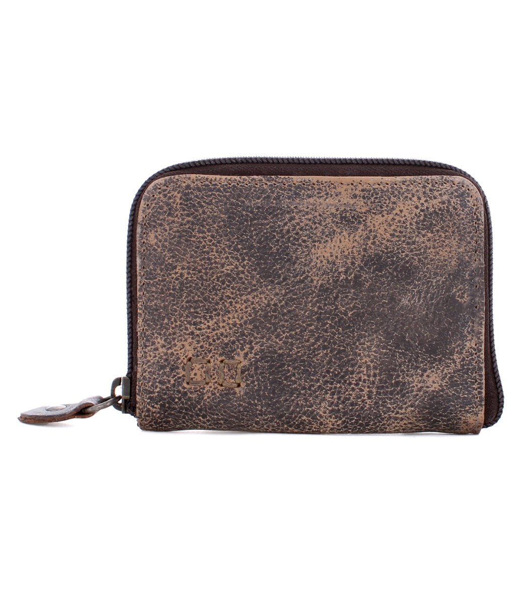 A brown leather Ozzie wallet on a white background by Bed Stu.