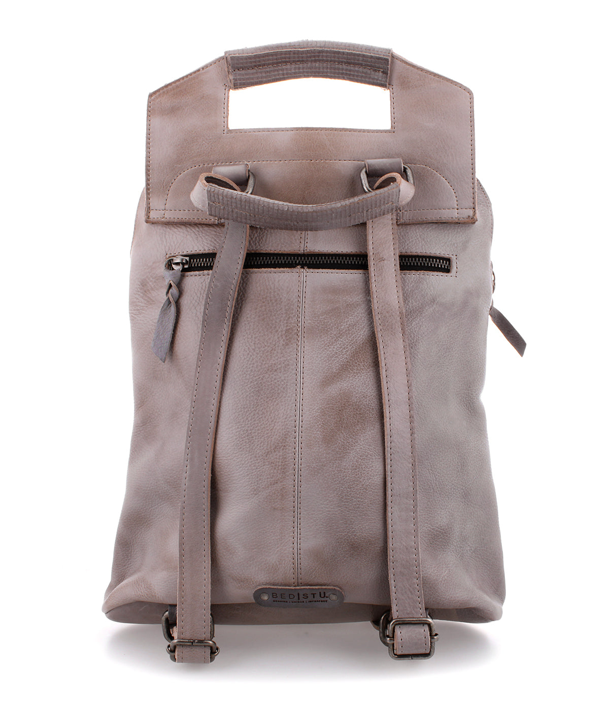 A grey leather Patsy backpack by Bed Stu with two straps and a handle.