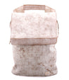 A white and beige Bed Stu Patsy backpack with a handle.