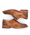 A pair of Bed Stu Plio men's tan derby shoes on a white background.