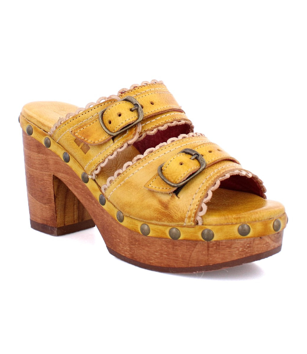 A women's yellow Poly sandal with a wooden heel, made by Bed Stu.