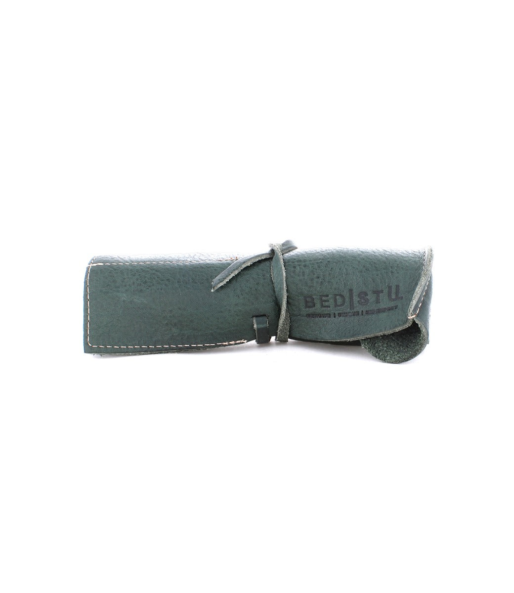 A green leather Prepped pencil case with a Bed Stu leather strap.