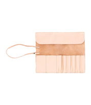 A tan leather wrap from the Leather Shoppe, featuring multiple compartments and a strap closure, perfect for holding artist tools or brushes.

Revised: The Prepped Leather Wrap from Bed Stu, featuring multiple compartments and a strap closure, perfect for holding artist tools or brushes.
