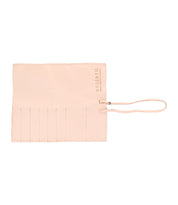 A flat, beige leather wrap with multiple slots and a tied strap closure perfect for artist tools. The brand name "Bed Stu" is stamped on it, showcasing the quality craftsmanship of our Prepped Leather Wrap.