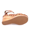 The sole view of a women's brown wedge sandal, Princess by Bed Stu.