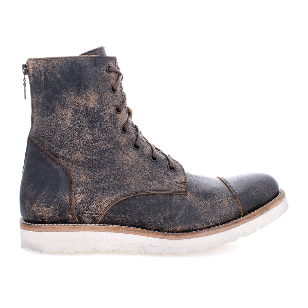 A single worn brown leather boot with laces, cushioned leather insoles, and a side zipper, standing upright on a white background. (Protege Light by Bed Stu)