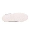 A Protege Light shoe with white soles on a white background by Bed Stu.