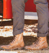 A man wearing a pair of Bed Stu Protege boots.