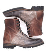 A pair of Bed Stu Protege Trek men's brown leather boots on a white background.