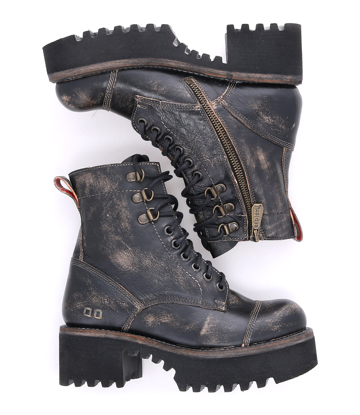 A pair of Bed Stu Prudence Hi black leather combat boots on a white background.