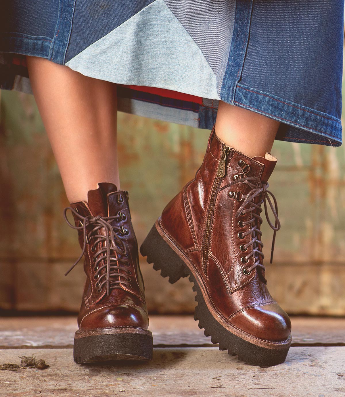 An edgy woman wearing Bed Stu's Prudence Hi with a denim skirt.