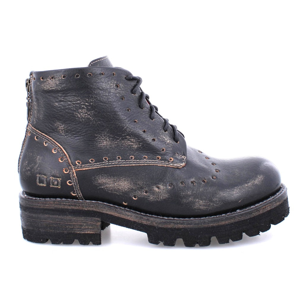 A black leather Quatro III boot with studs and by Bed Stu.