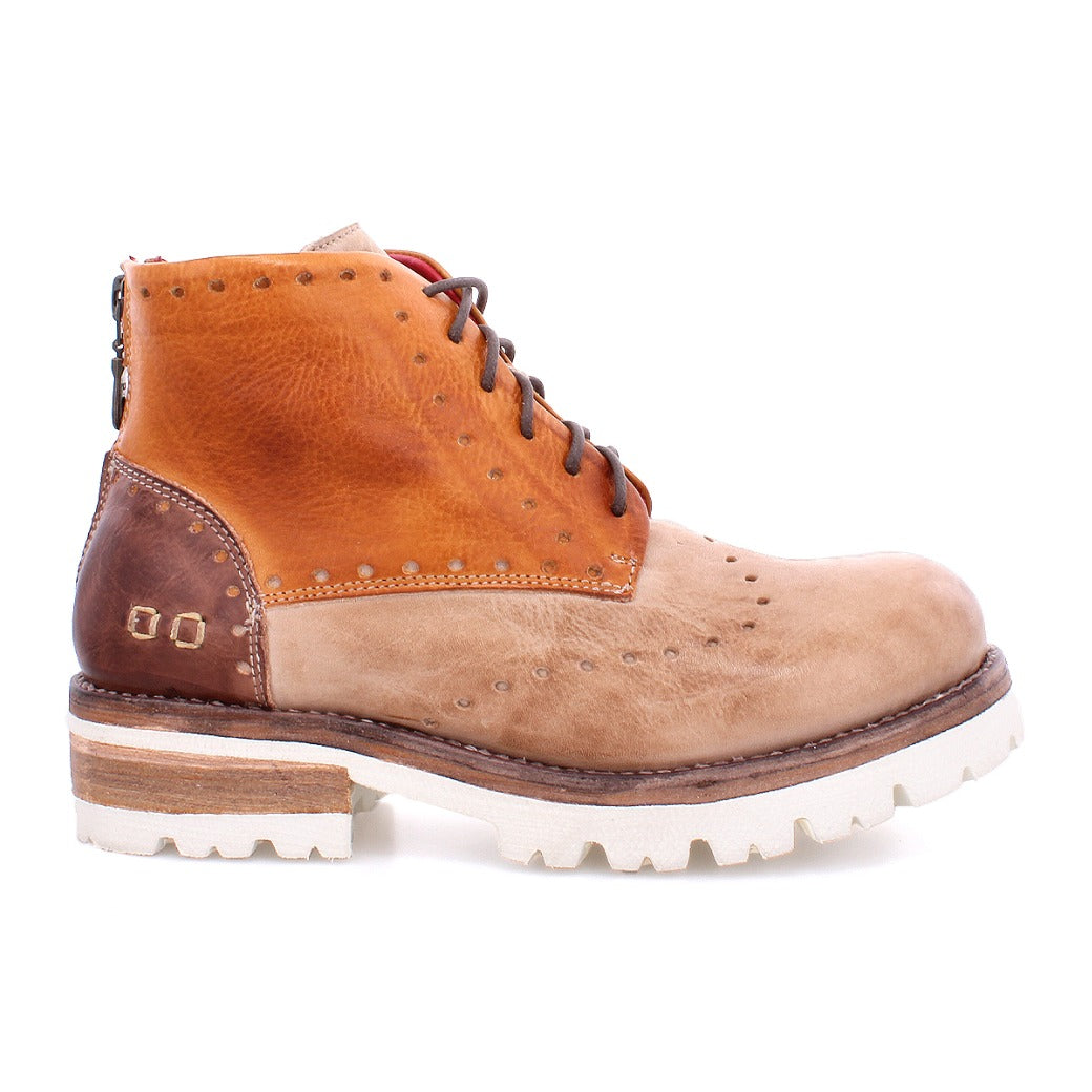 A pair of Bed Stu Quatro III brown and tan boots with a white sole.