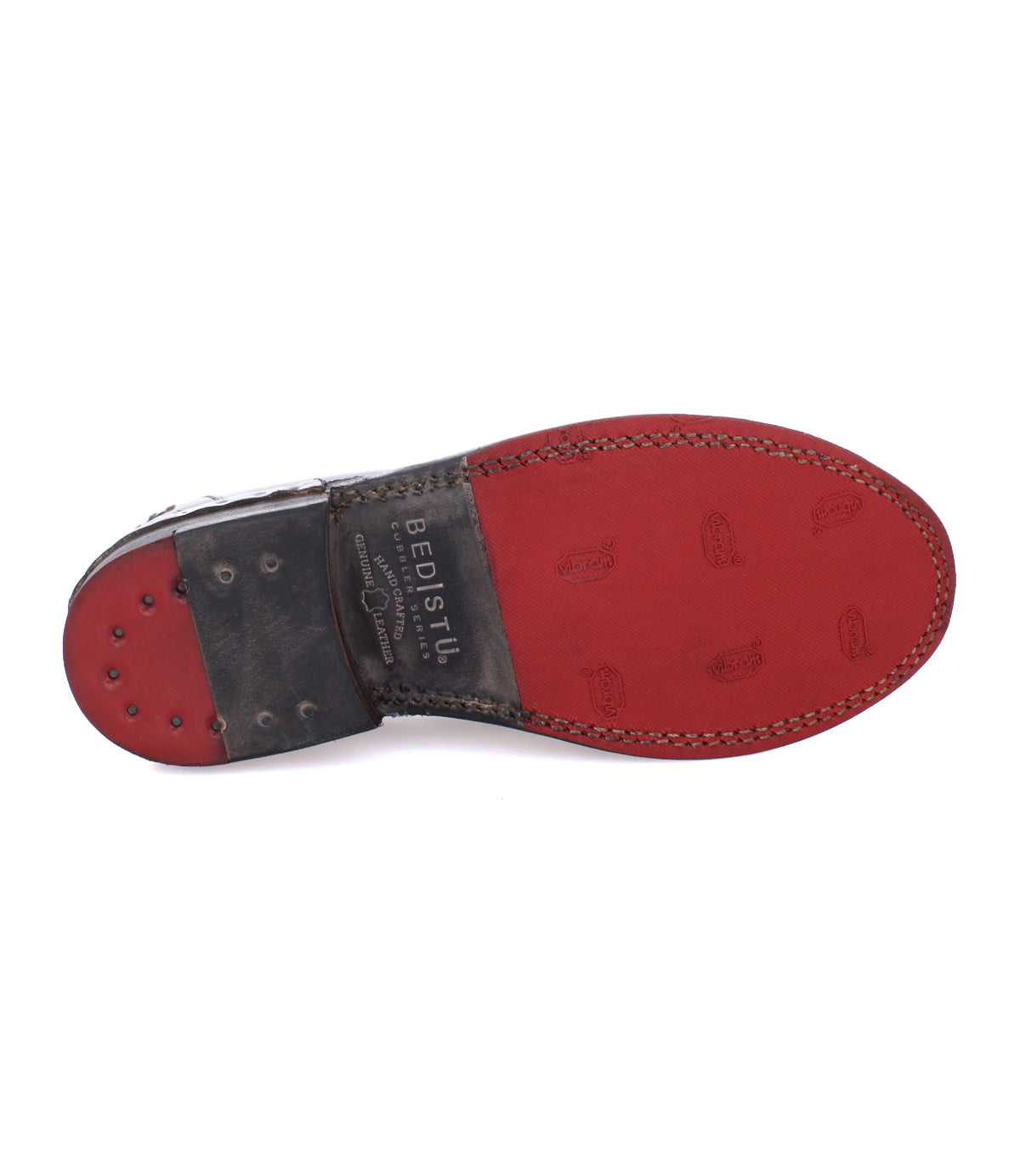 A pair of Bed Stu Reina women's shoes with a red sole.