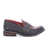 Reina by Bed Stu women's brown loafer with a red sole.