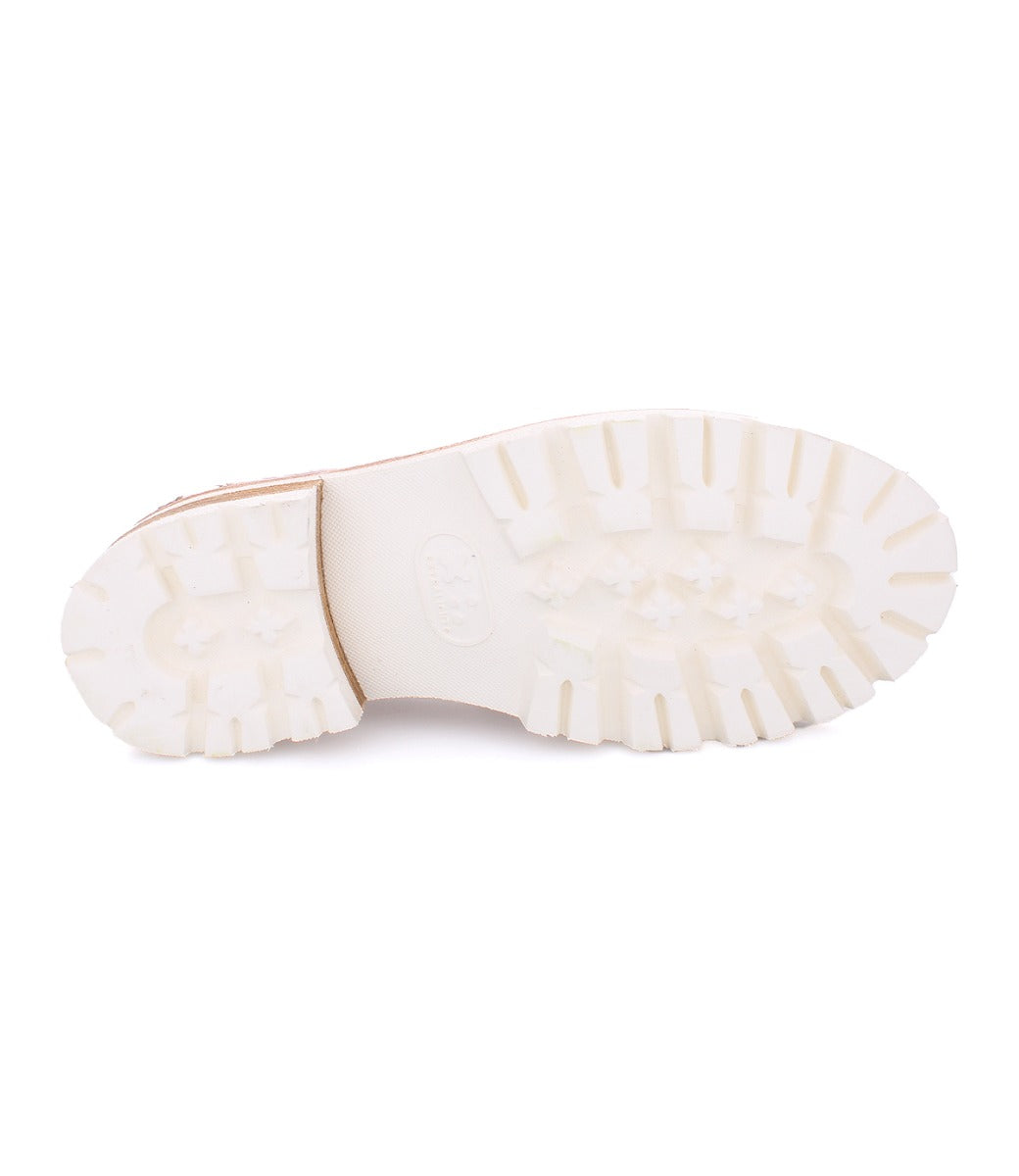 A Reina III shoe with white soles on a white background by Bed Stu.