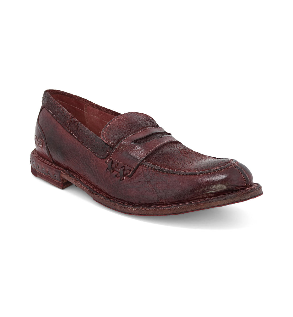 A women's Reina burgundy loafer on a white background by Bed Stu.