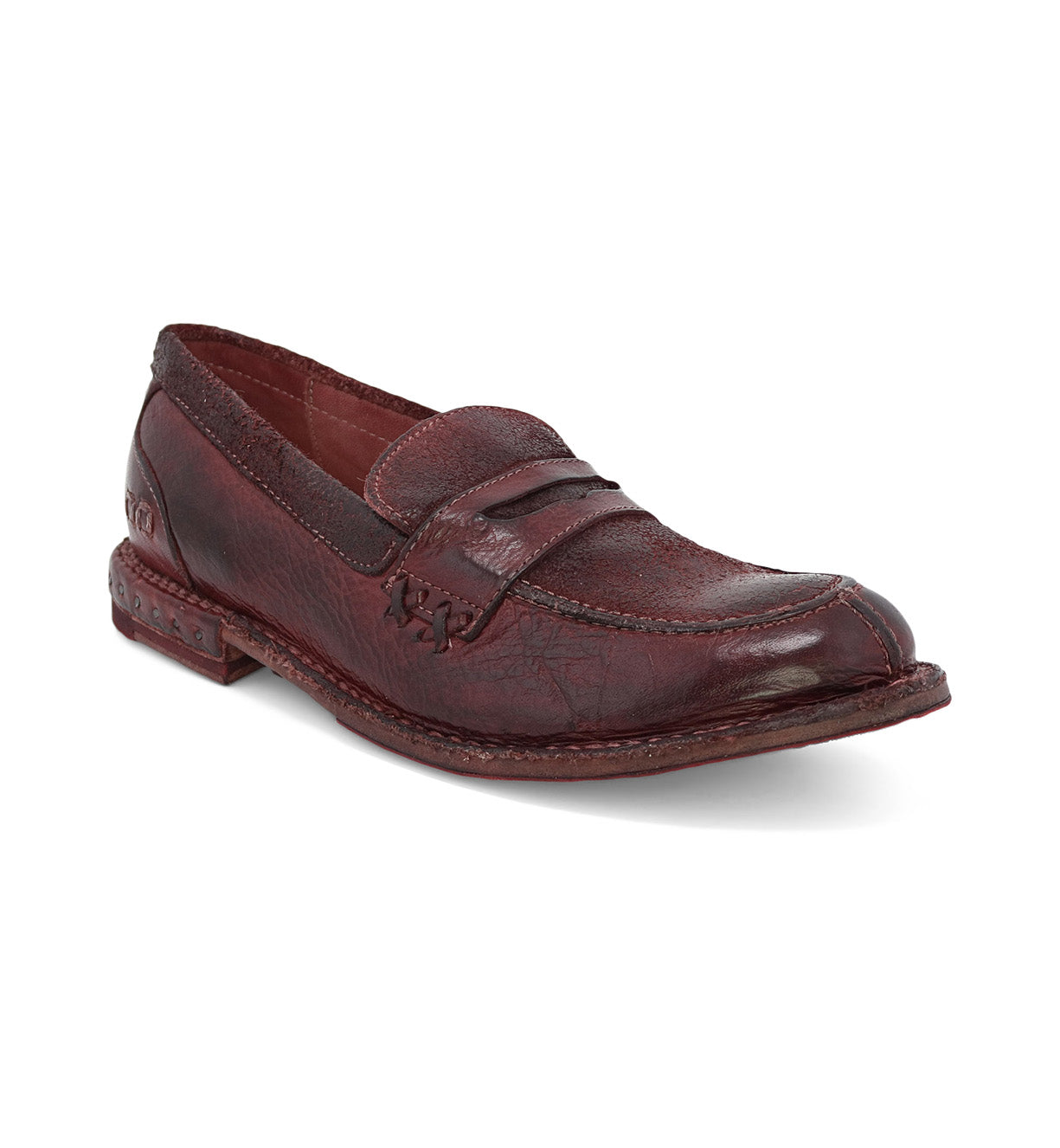A women's Reina burgundy loafer on a white background by Bed Stu.
