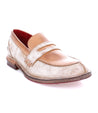 A women's Reina loafer by Bed Stu with a tan sole.