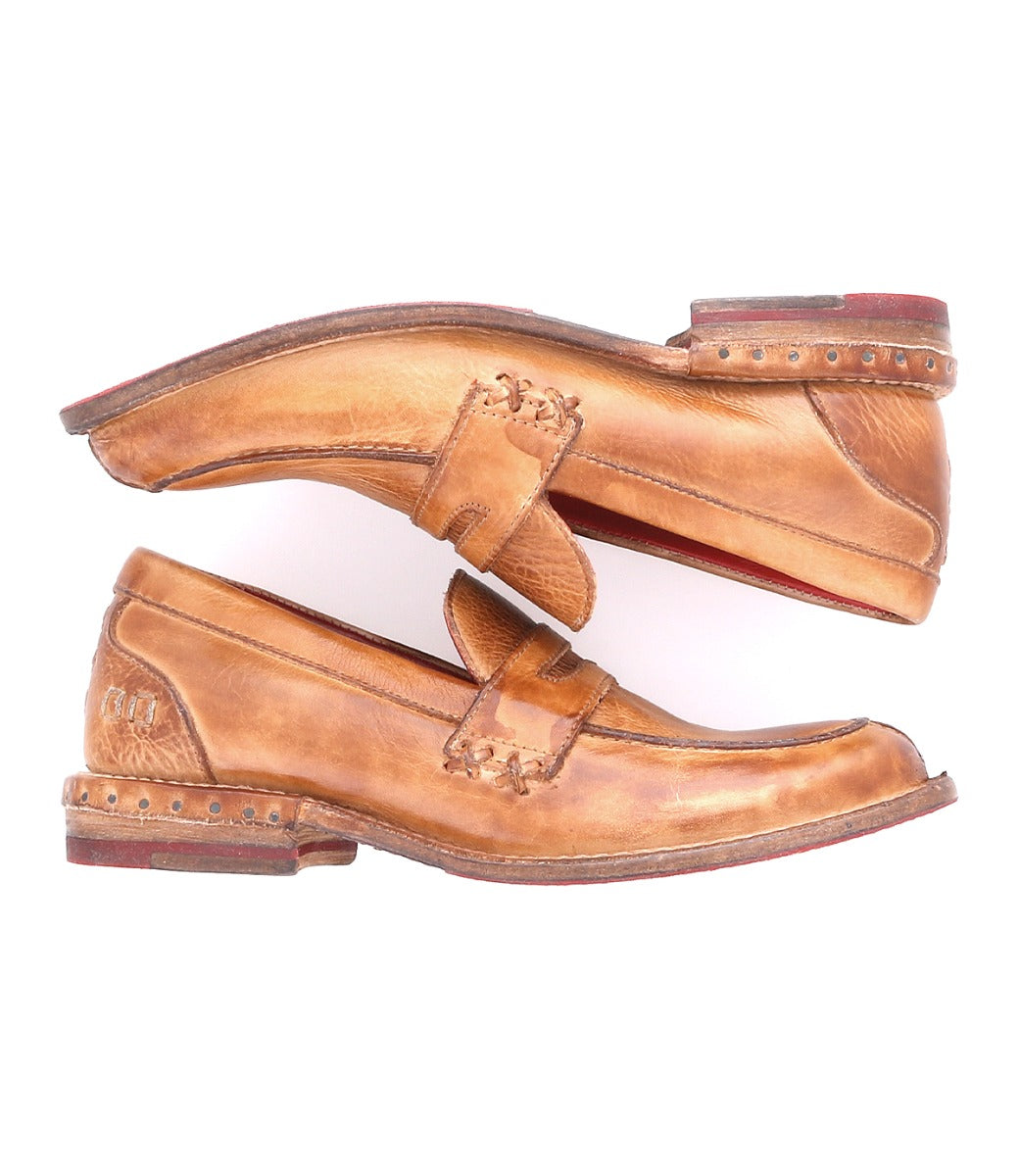 A pair of Bed Stu Reina women's brown loafers with studded soles.