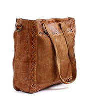 A Renata LTC brown leather tote bag with rivets from Bed Stu.
